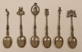 A SET OF SIX DUTCH SILVER SPOONS each with twist stems and engraved heraldic bowls inscribed with
