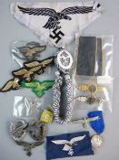 LUFTWAFFE MEMORABILIA to include a quantity of uniform chest eagles, a sport's shirt chest eagle,