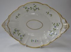 A SWANSEA PORCELAIN CENTRE DISH with cornflower decoration and twin handles (restored), 36cms long