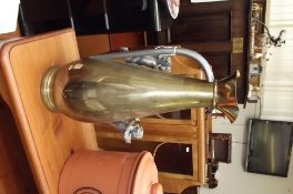 Large brass jug with applied plated cherubs