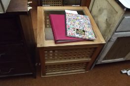 Glass topped side table with fretwork supports