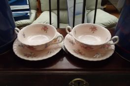 Pair of Minton soup bowls and saucers