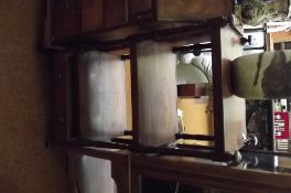 Edwardian whatnot with apron drawer, on original c