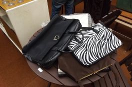 Assorted lady's handbags