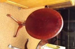 Tilt top wine table