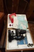 Cased microscope with slides