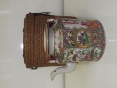 Late 19th century Canton teapot, cylindrical form decorated with figures, flora and fauna, contained