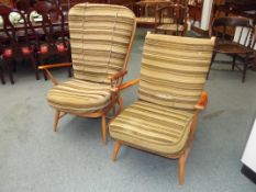 Two Ercol open armchairs in beech