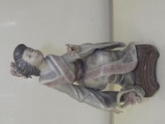 Lladro figure depicting oriental lady, 20cm.