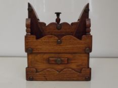 Victorian folk art money box, a pivoting figure ti