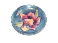 A small Moorcroft pin dish. 12cm diameter