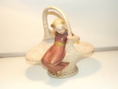 Royal Dux basket with a seated girl