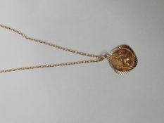 9ct gold chain with a 9ct gold St Christopher pend