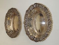 Pair of Edwardian silver bonbon dishes, pierced qu