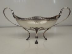 Art Nouveau silver twin handled bowl, sinuous hand
