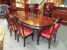 Late 20th century rosewood dining table and six ch