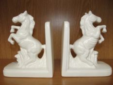 Pair of ceramic blanc de chine bookends in the for