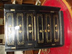 Ebonised and brass inlaid collector's cabinet