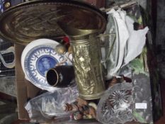 Assorted items to include brass wall chargers etc