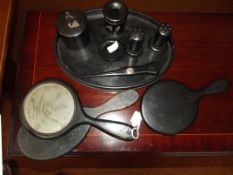 Ebony dressing table set with silver overlay