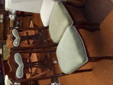 Pair of Edwardian overstuffed chairs with pierced