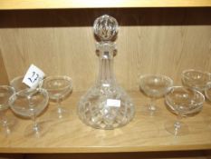 Set of 8 champagne glasses together with a decante