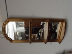Gilt framed and shelved wall mirror