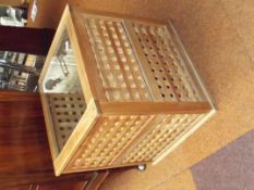 Glass topped side table with fretwork supports