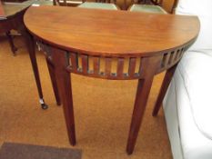 Demi lune hall table with fretwork frieze