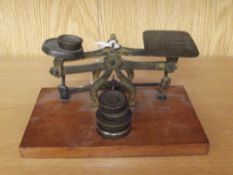 Set of early brass postal scales and weights
