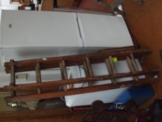 Set of wooden extending ladders