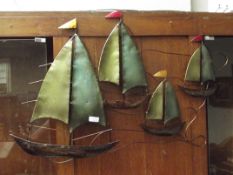 Metal wall plaque, depicting yachts