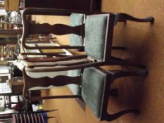 Set of four Queen Anne style dining chairs in oak