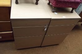 Two office filing cabinets