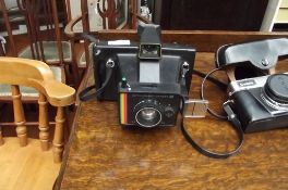 Polaroid vintage land camera- super colour swinger
