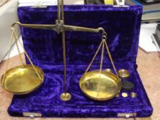 Set of brass balance scales in fitted velvet case