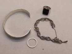 Four items of silver jewellery, bangle, bracelet a