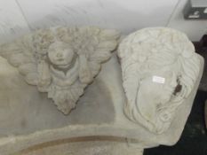 Two stoneware wall fonts
