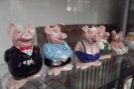 Set of 5 Wade Nat West pigs, with stoppers