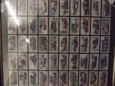 Framed and mounted Will's cigarette cards with gla