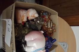 Large collection of money boxes, brass, ceramic et