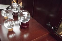 2 crystal balls on stand