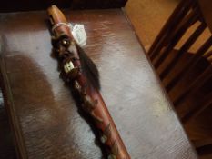 Tribal grotesque instrument inset with teeth
