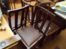 Set of four oak dining chairs