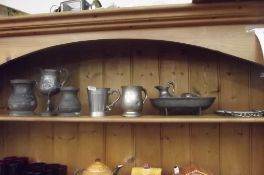 Shelf of pewter