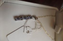 9 ct gold chain tanzanite pendant