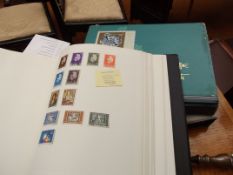 Three stamp albums