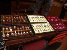 3 cases of souvenir spoons