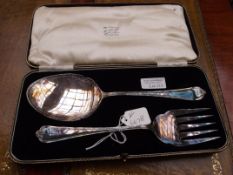 Cased set of plated salad servers