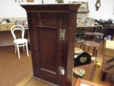 Small oak corner cupboard